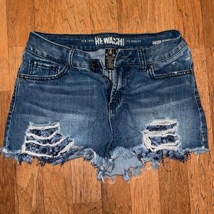 Women gently ripped denim shorts- Size 5/27. I’m size S for reference.